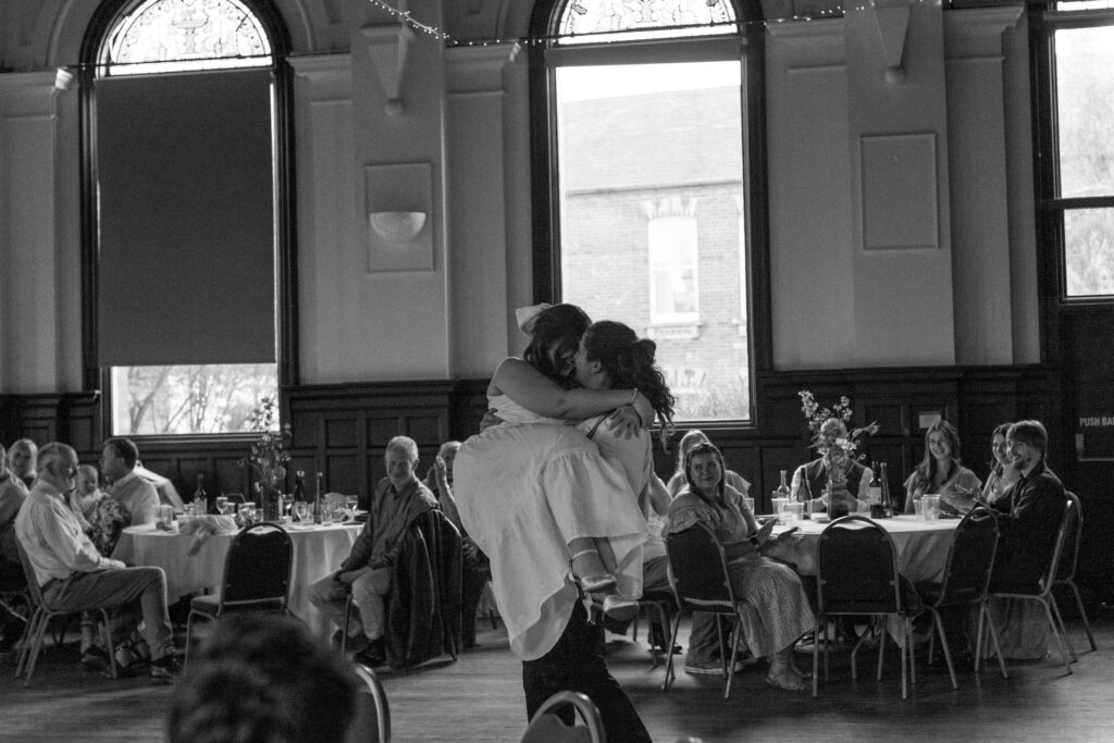Dancing a lift during their First Dance